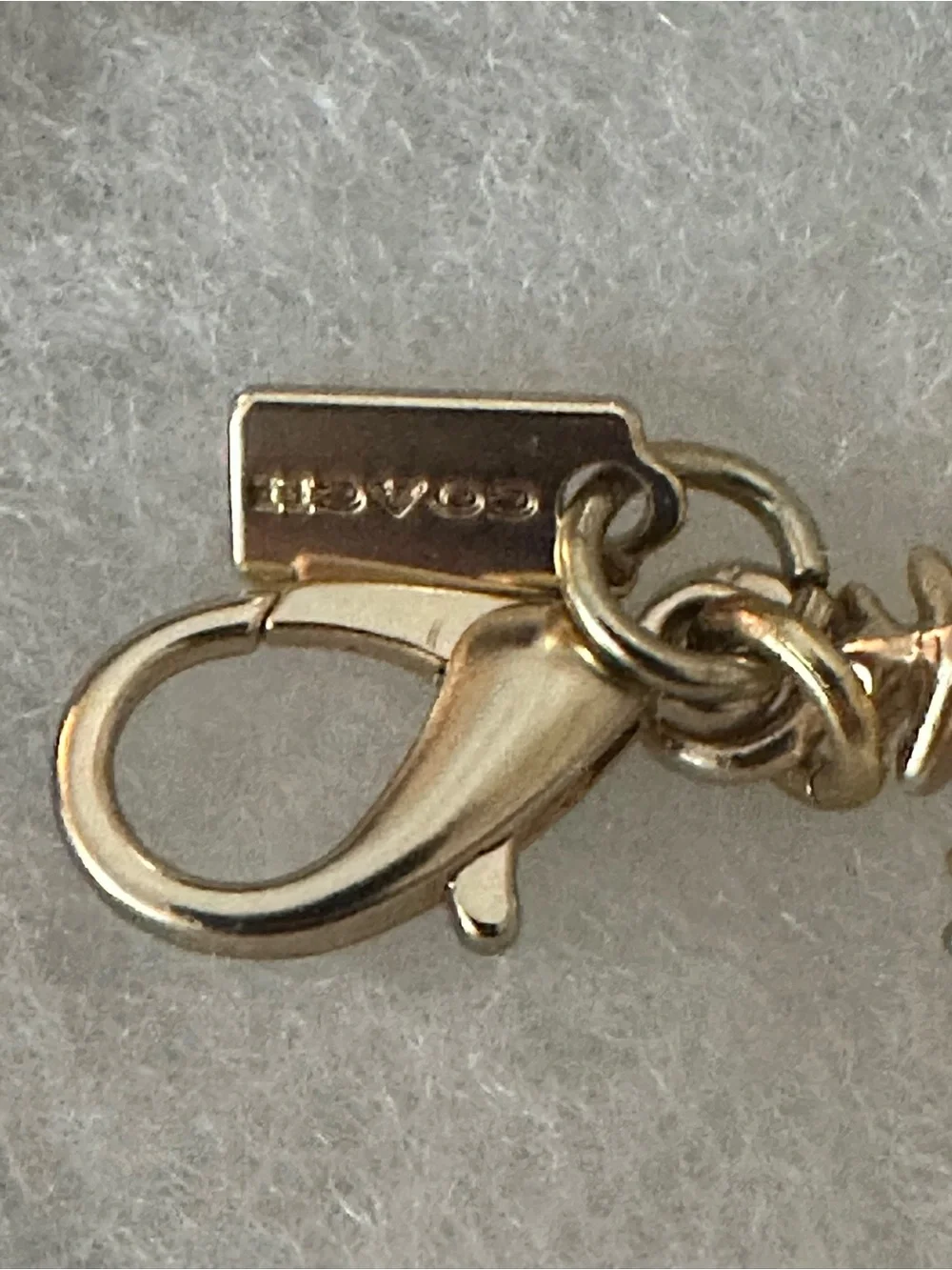 Coach Gold-Tone Snowflake Bag Charm with Logo Branded Tag - Collectible Gift